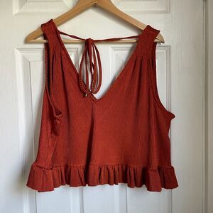 Rust Sleeveless Ruffle Hem Top